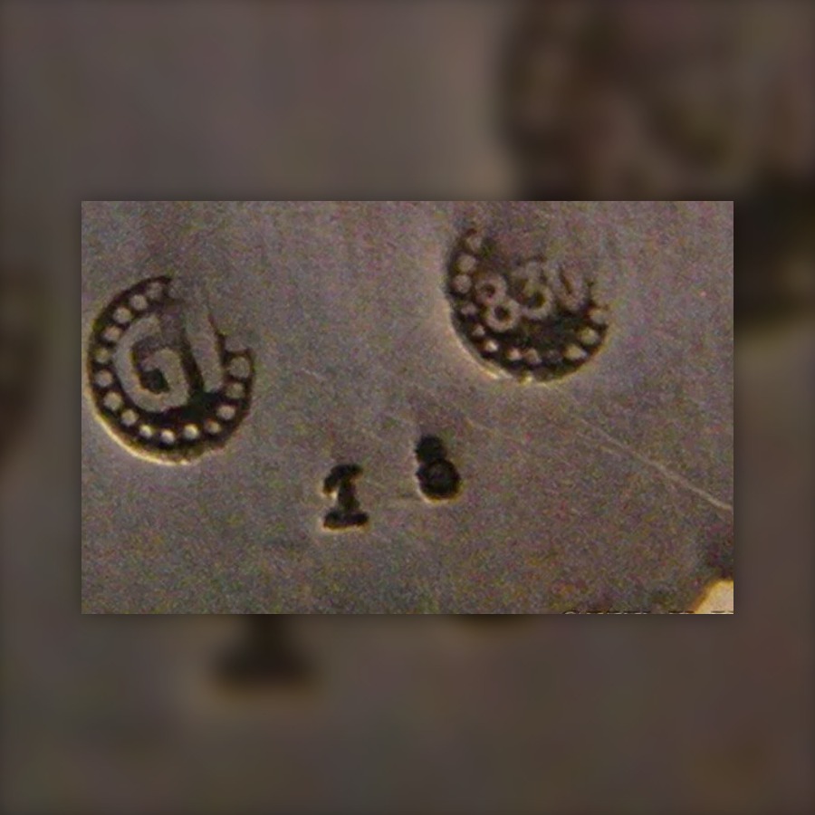 Georg Jensen Early GI and GJ Mark hallmark, Conjoined GJ monogram or G.I., struck with the Danish silver standard 826S (later 830S), sometimes with GEORG JENSEN or COPENHAGEN