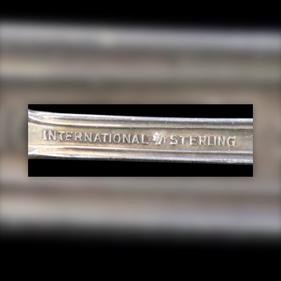 International Silver International Sterling Mark hallmark, The words INTERNATIONAL STERLING in small block or script letters, often with the pattern name