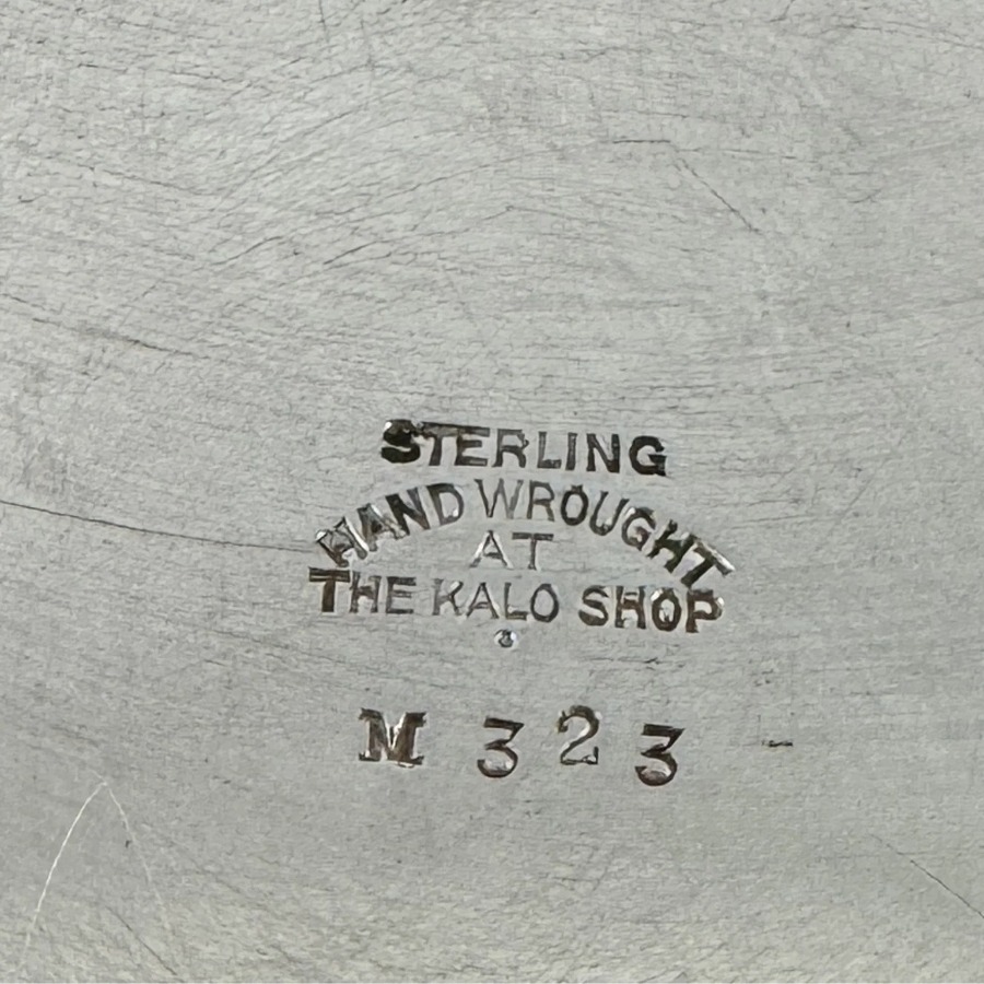 Kalo Shop Hand Wrought Mark hallmark, STERLING with HAND WROUGHT / AT / THE KALO SHOP(S), often with a city name and a model number