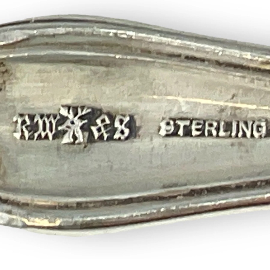 Wallace RW&S Stag's Head Mark hallmark, A stag's head with the initials RW on one side and &S on the other, with STERLING