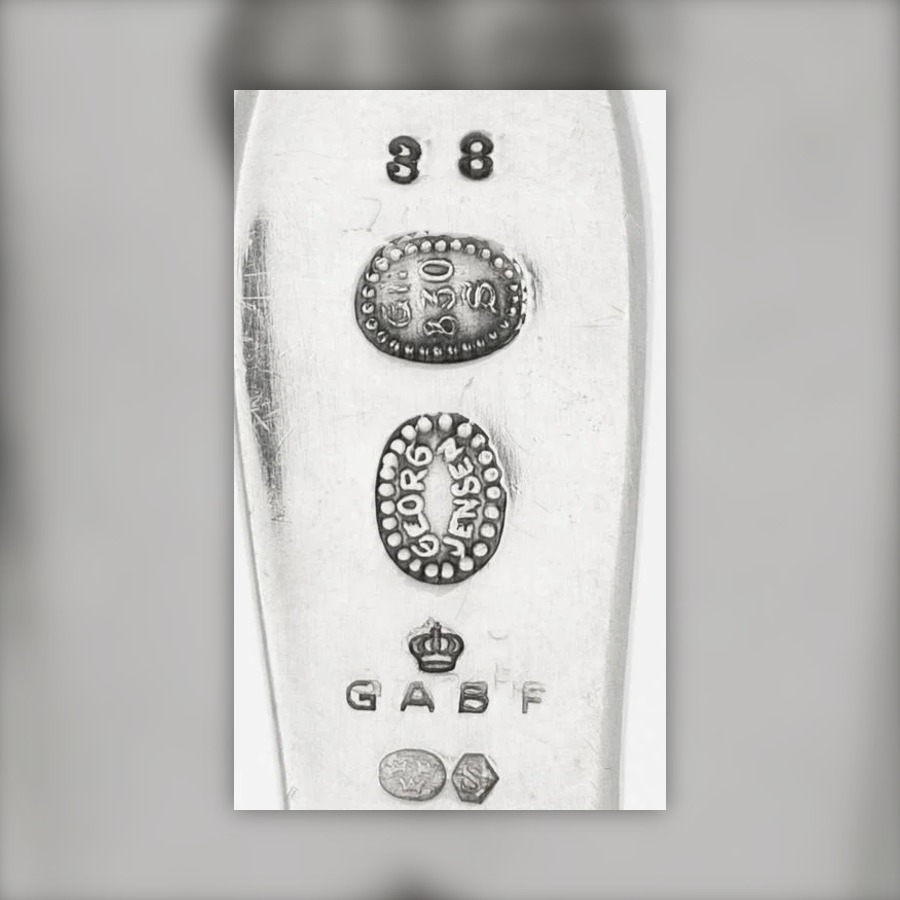 Georg Jensen Dotted Oval Mark with G.I. 830S hallmark, GEORG JENSEN inside an oval of raised dots, often a second dotted oval reading COPENHAGEN, and G.I. over 830 S in a dotted oval
