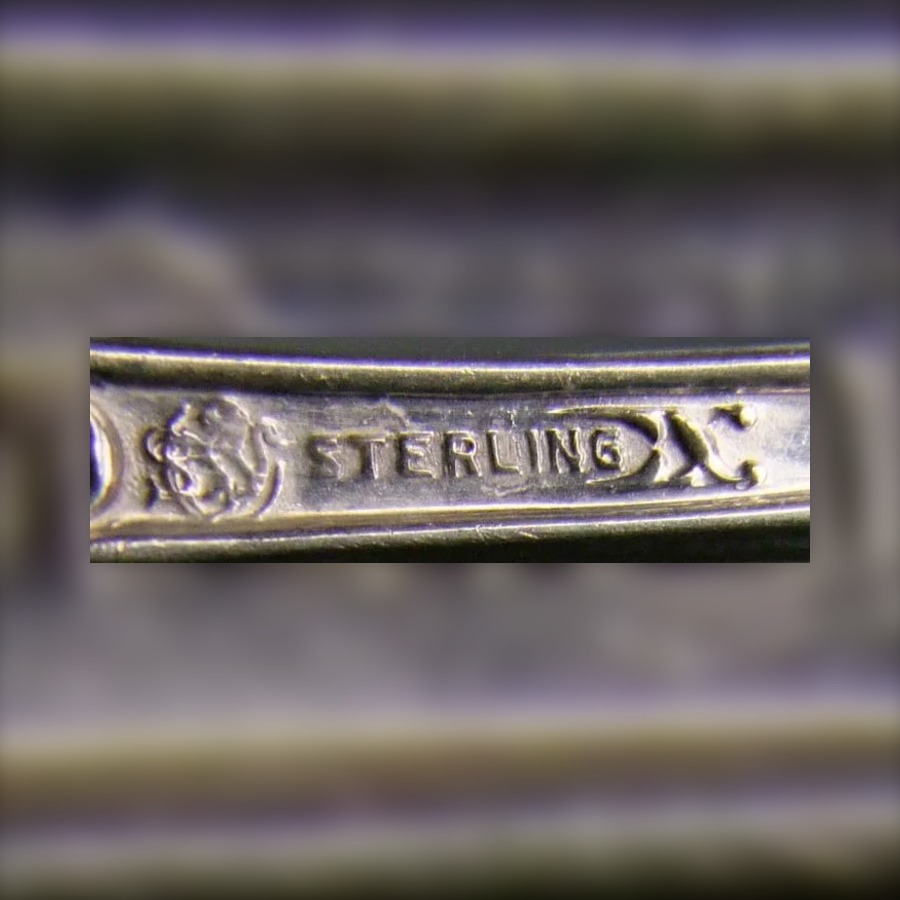 Frank Smith Lion and S Mark hallmark, A lion paired with a capital S, sometimes on a crescent or in a circle, with STERLING or 925/1000 FINE